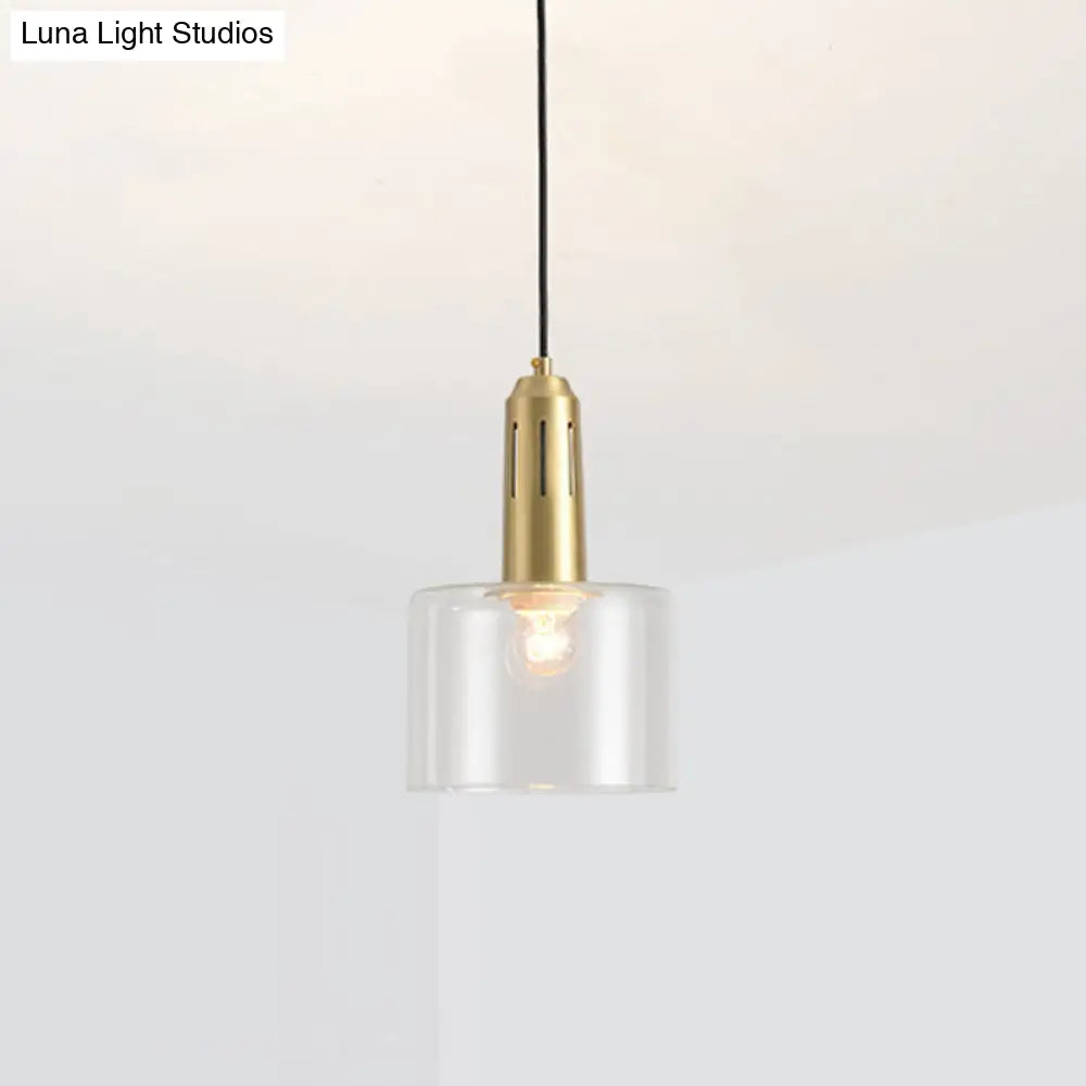 Postmodern Brass Pendant Lamp with Clear Glass Shade: Sleek Dining Room Hanging Light