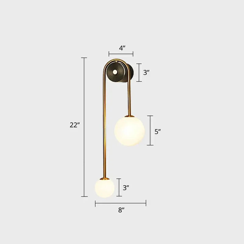 Modern brass-finished wall sconce light with two opal glass shades compatible with 220v-240v and 110v-120v
