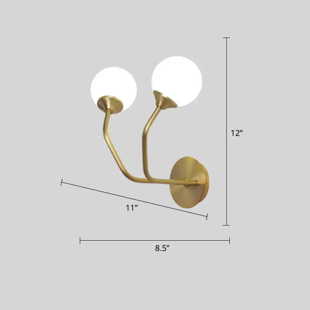 Postmodern brass white glass geometric wall sconce with two curved arms holding white glass spherical shades for living room