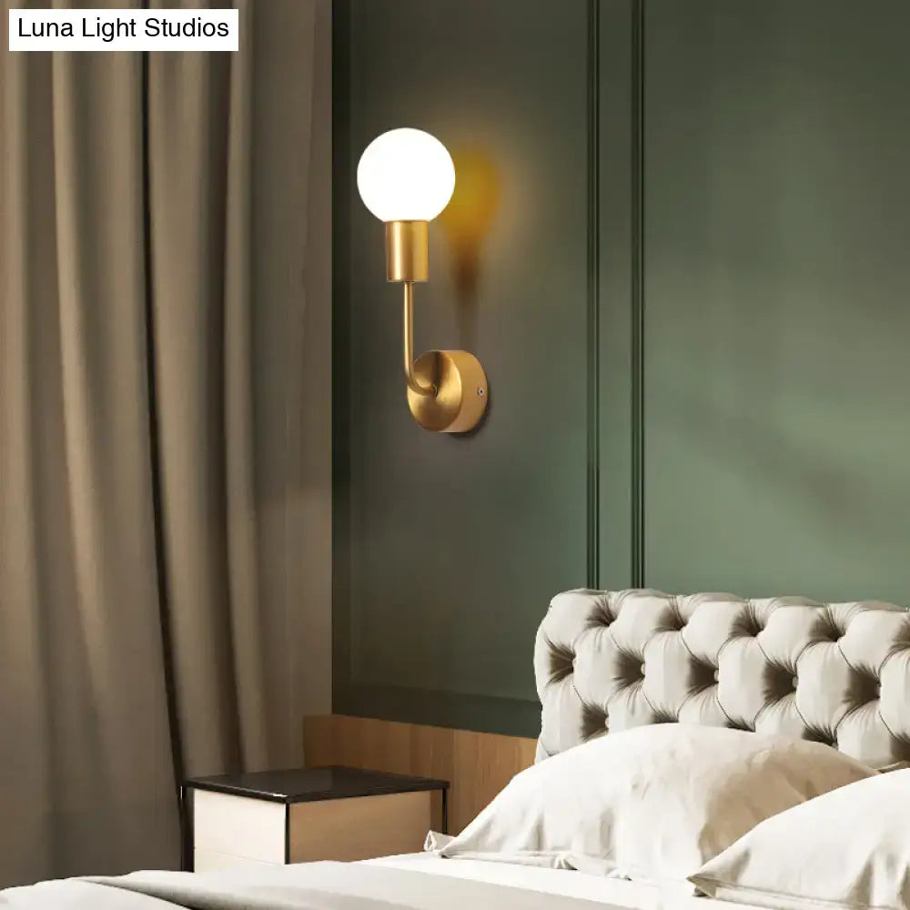 Postmodern brass wall sconce with white glass geometric frosted spherical bulb for living room lighting