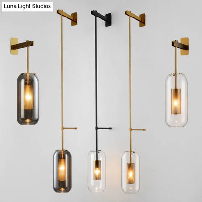 DecorBites™ DecorBites™ Postmodern Capsule Wall Hanging Light Clear Glass Bedside Lamp, 1 Bulb, Interior Mesh Guard, Black/Gold