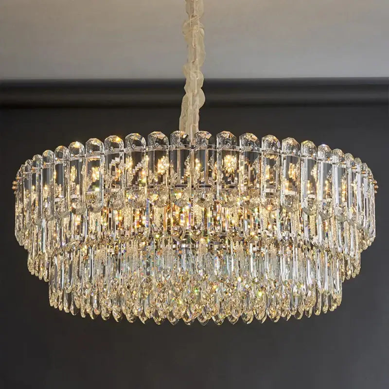 Postmodern clear and gold decorbites crystal chandelier with faceted glass rods and teardrop crystals for dining room