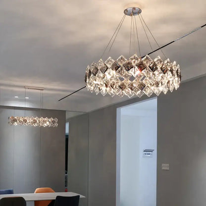 A modern decorbites crystal chandelier with clear and smoky faceted crystals in a circular ring design for living rooms
