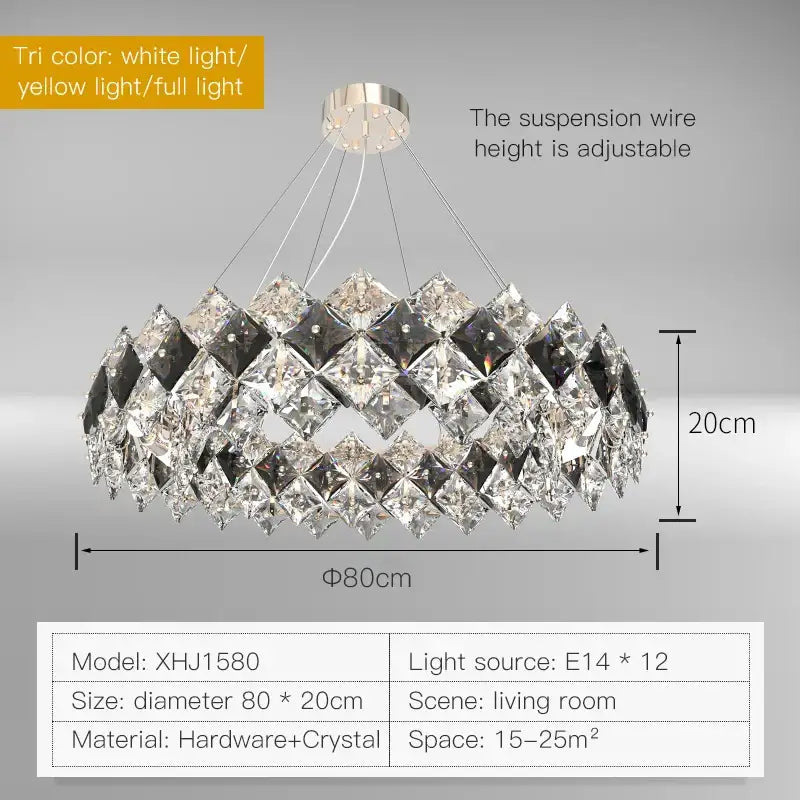 A modern decorbites crystal chandelier with faceted clear and smoky crystals on a metallic oval base for living rooms