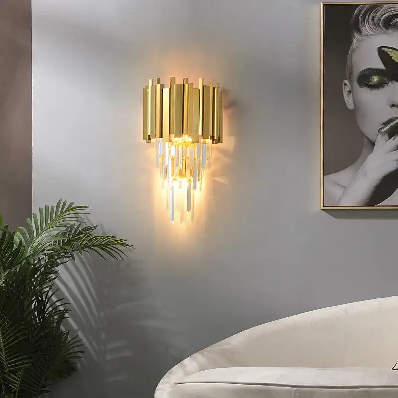 Postmodern wall sconce with vertical cylindrical bars and crystal golden led accents by decorbites for living room decor