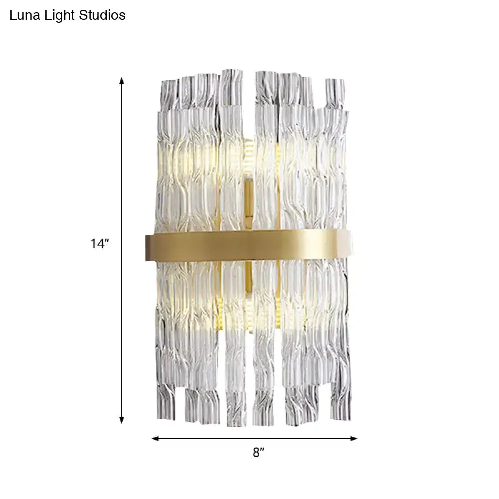 Postmodern crystal rod brass wall light fixture with clear textured glass rods and a sleek gold-toned metal band