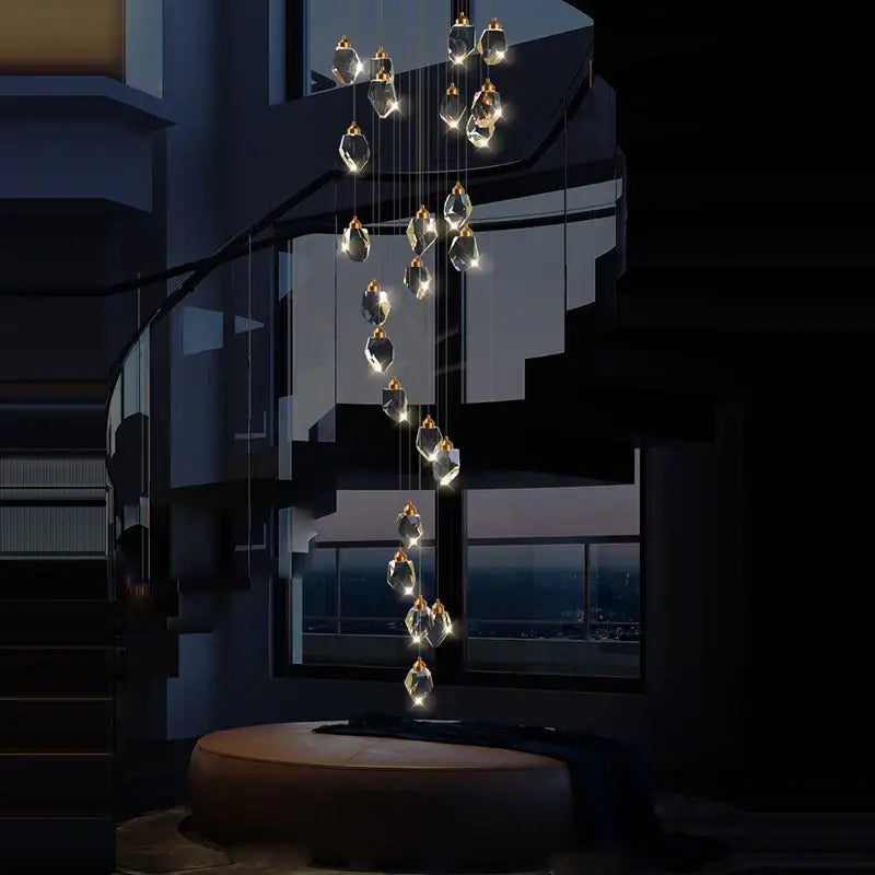 A modern stone copper chandelier with clear faceted glass pendants for staircase lighting by decorbites crystal stone