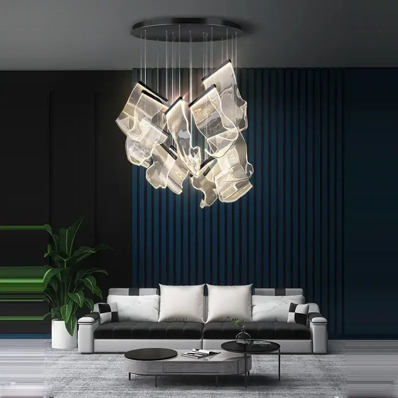 Modern chandelier with translucent sculptural glass elements and black mount from decorbites golden love paper collection