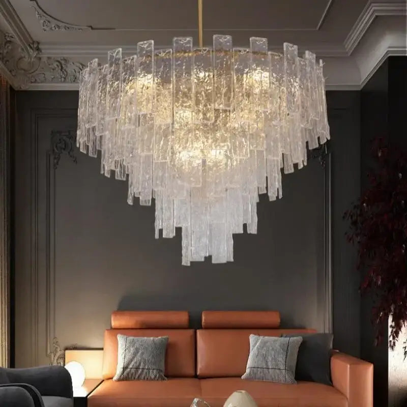 A postmodern decorbites crystal chandelier with cascading frosted glass rods emitting a warm glow for dining rooms