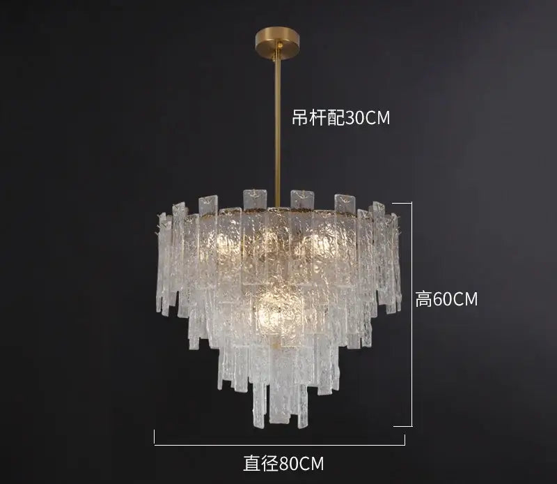A postmodern decorbites crystal chandelier with brass-finished rod and frosted glass shards for dining room lighting
