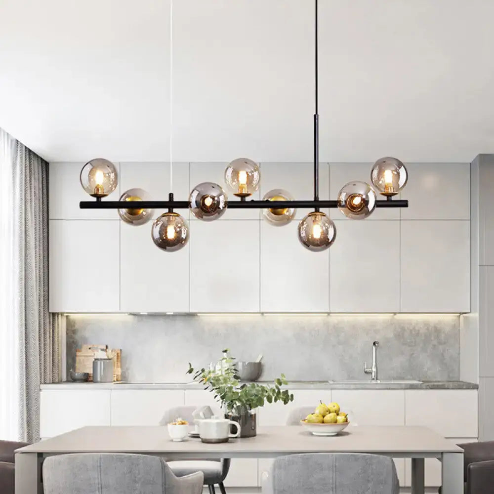 Modern black metal pendant light with smoked glass globe bulbs from decorbites postmodern collection for kitchen use