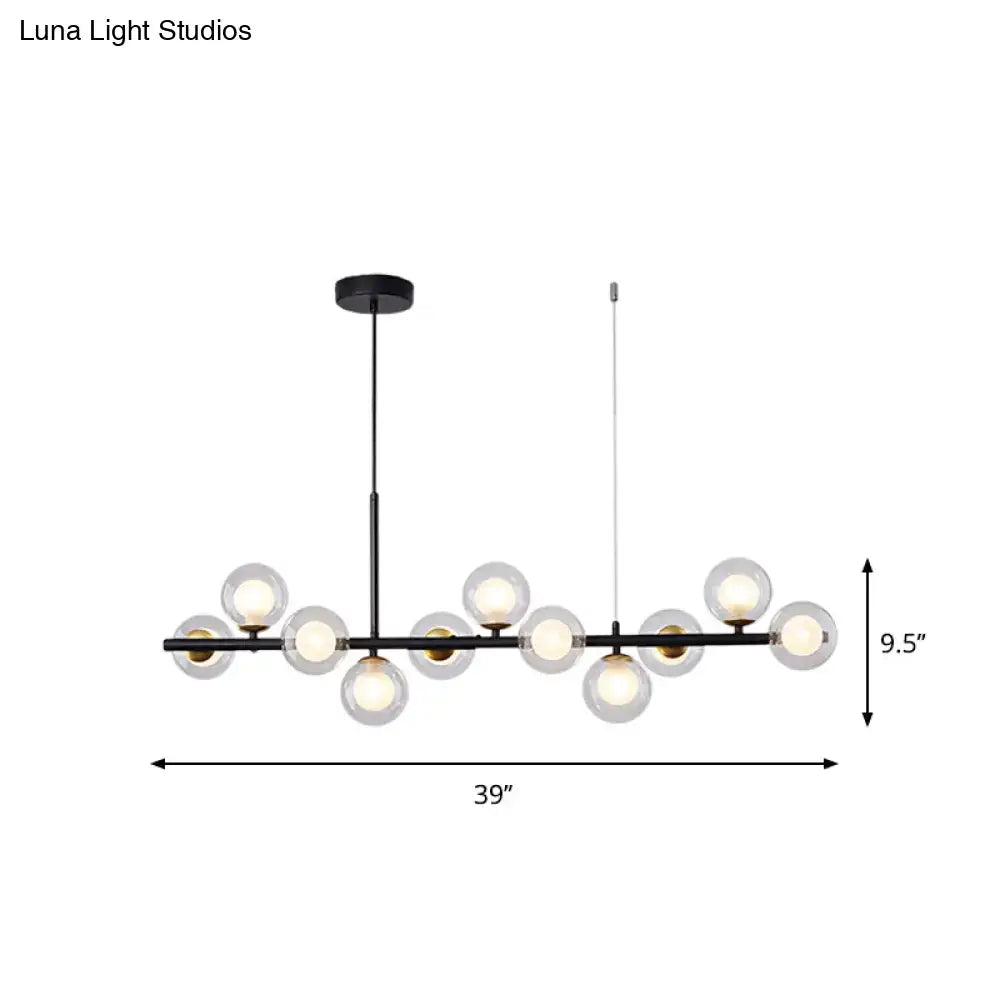 DecorBites postmodern black metal pendant light with clear glass globe bulbs and gold-toned accents for kitchen use