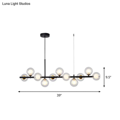 DecorBites postmodern black metal pendant light with clear glass globe bulbs and gold-toned accents for kitchen use