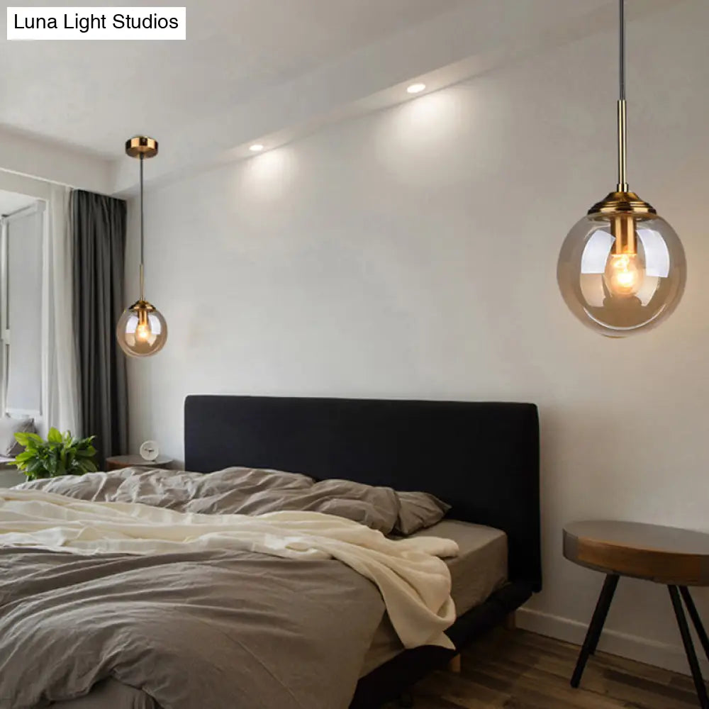 Postmodern Glass Pendant Light: Sphere Drop Design with Bedside & Ceiling Mounts - Brass Finish