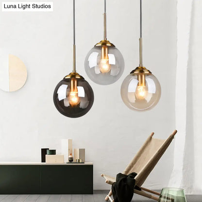 Postmodern Glass Pendant Light: Sphere Drop Design with Bedside & Ceiling Mounts - Brass Finish