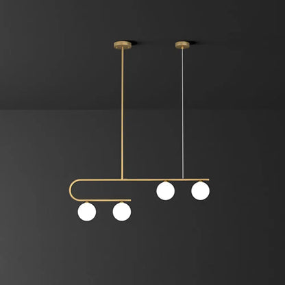 DecorBites postmodern gold linear island pendant light with curved metal frame and four ivory ball glass bulbs