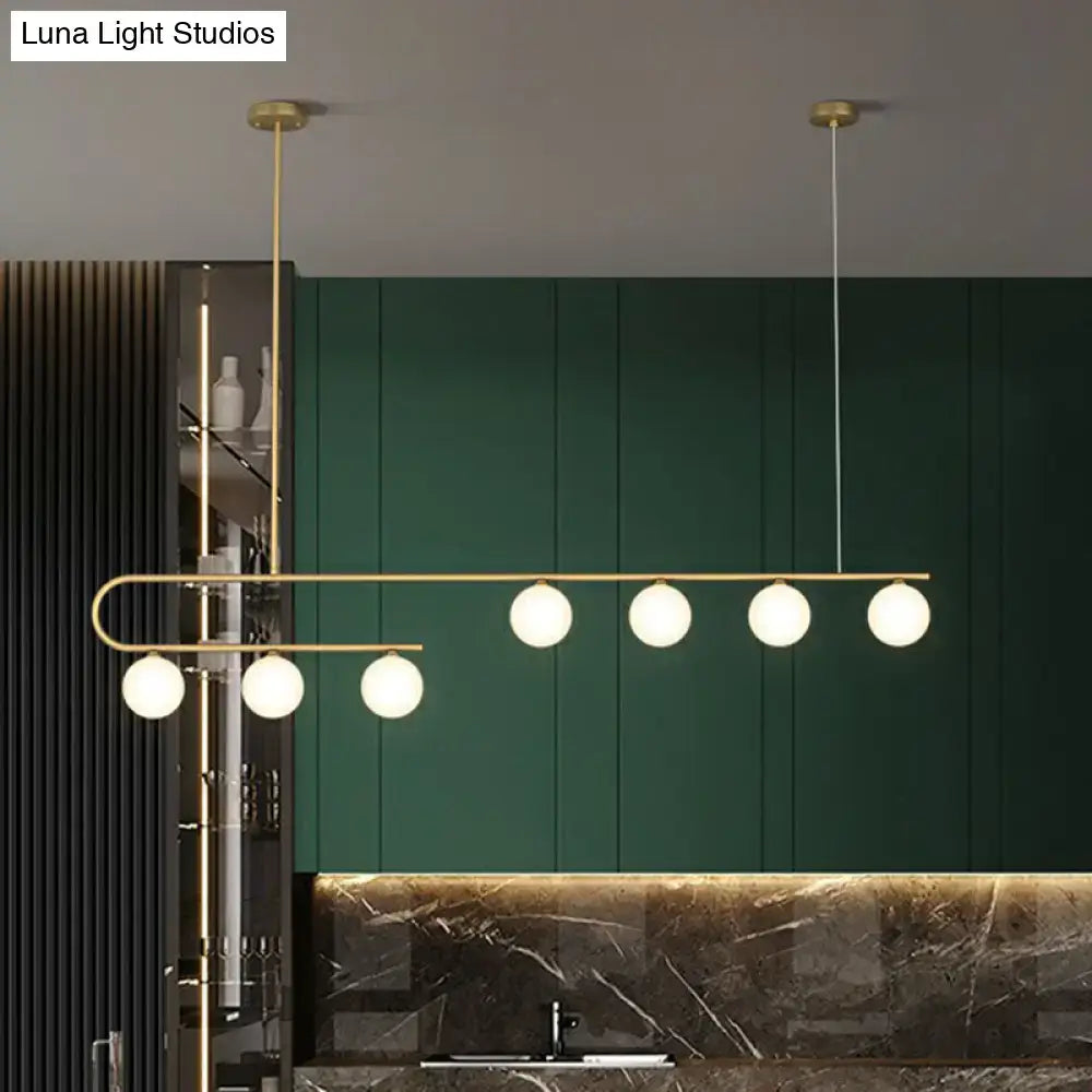 Modern brass DecorBites™ postmodern gold linear island pendant light with five ivory ball glass bulbs LED hanging lamp