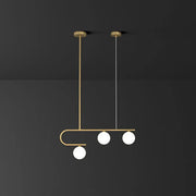 DecorBites™ postmodern gold linear island pendant light with ivory ball glass and three spherical bulbs suspended by rods
