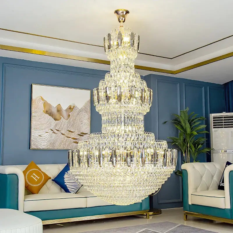 Postmodern decorbites crystal chandelier with gold ceiling mount and cascading glass elements for hotel lobby decor