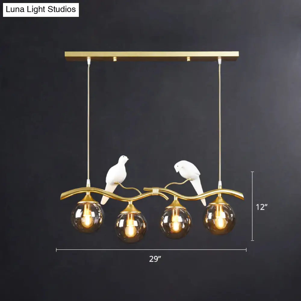 Gold-toned decorbites sleek postmodern pendant light with amber glass globes and white ceramic bird deco for led incandescent fluorescent bulbs 110v-120v 220v-240v