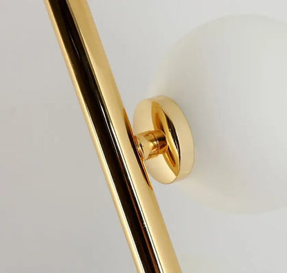 Gold finished metal rod with circular mounting bracket for postmodern gold and black glass floor lamp cascade light