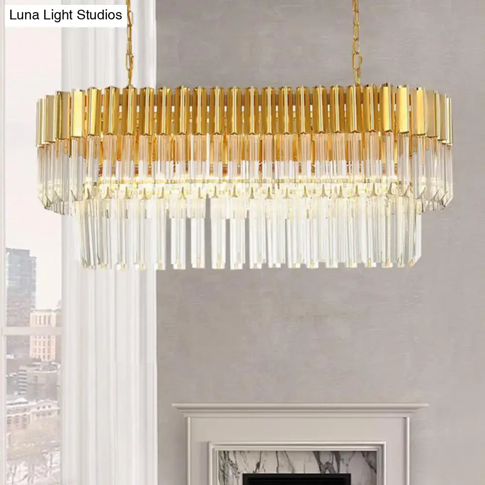 Postmodern gold and clear crystal tiered light fixture designed as an island light for dining rooms