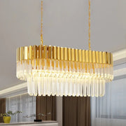 Postmodern gold and clear crystal light fixture with vertical gold bars and cascading glass prisms for dining room