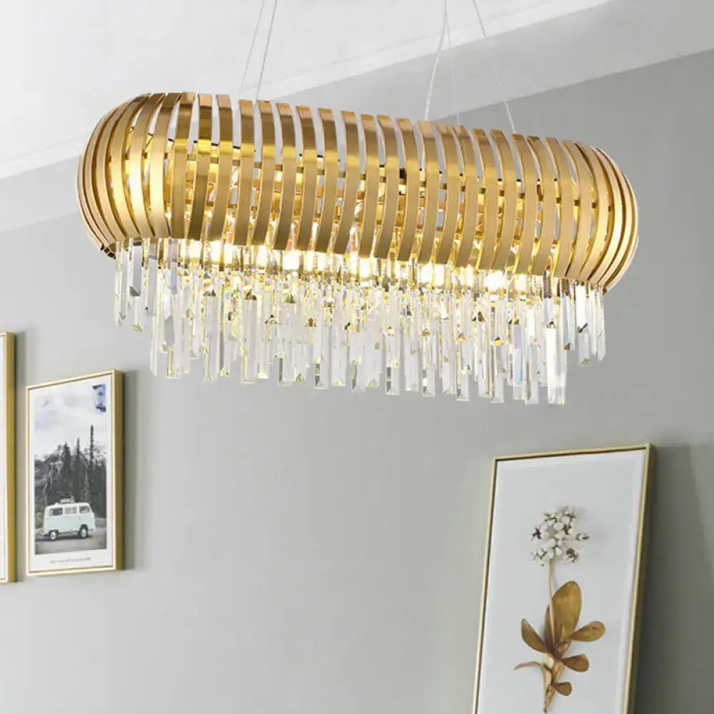 Postmodern gold crystal oval chandelier with vertical slats and dangling prisms for dining room island lighting
