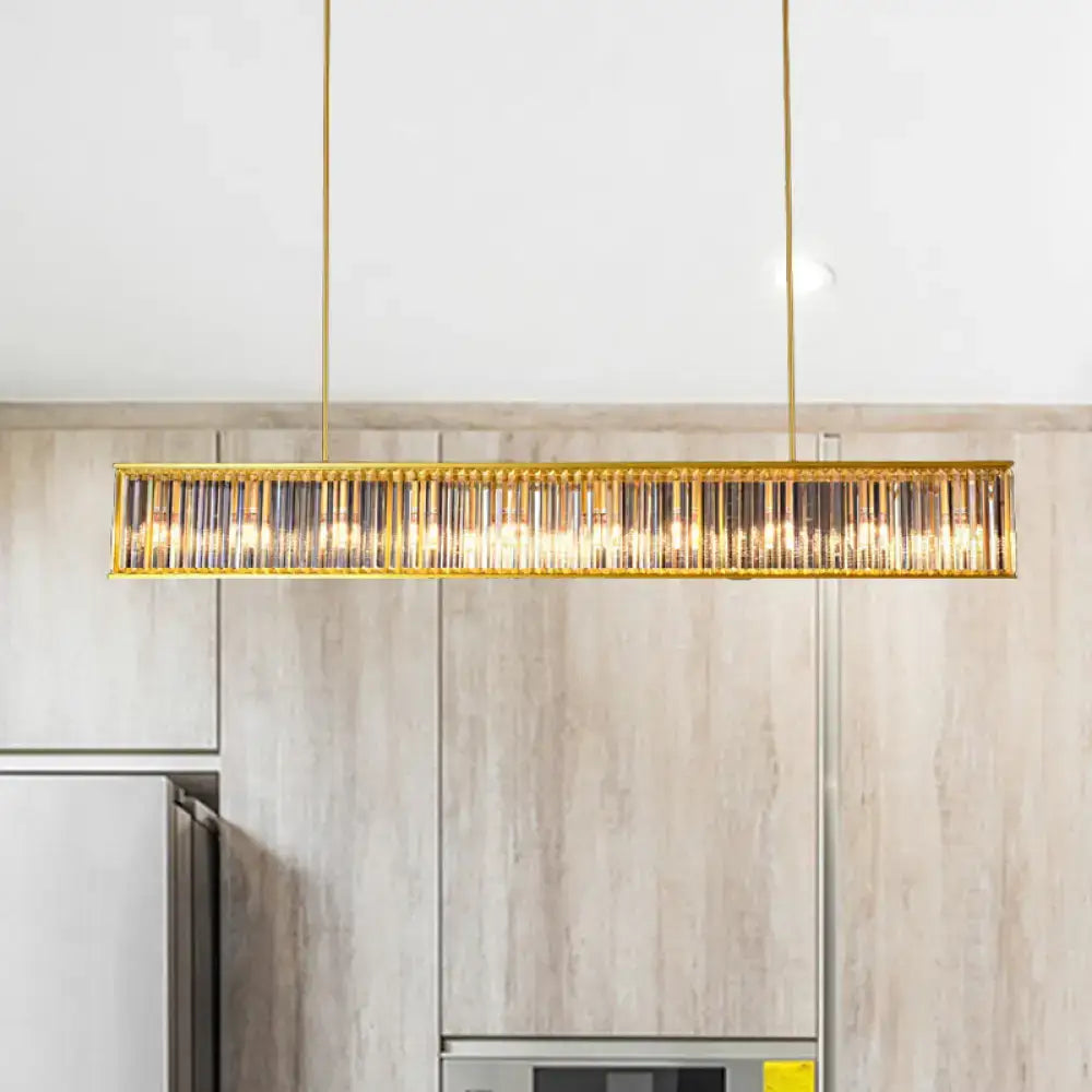 DecorBites gold crystal rod island light with gold-toned rectangular shade shape and warm glowing vertical rods