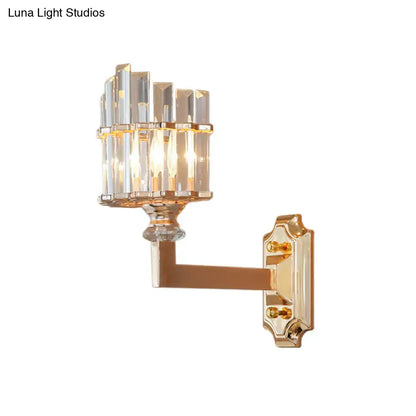 Postmodern gold crystal rod wall light featuring a cluster of clear faceted crystal bars in an upward tiered design wall mounted lamp