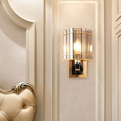 Postmodern gold crystal triangle wall light with gold-toned glass cage and amber panels for chic living space wall light