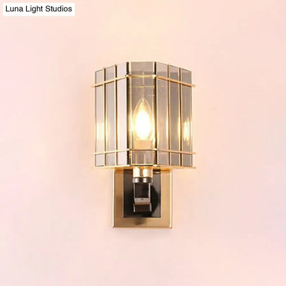 Postmodern gold crystal triangle wall light with a gold-toned geometric glass cage design for chic living space