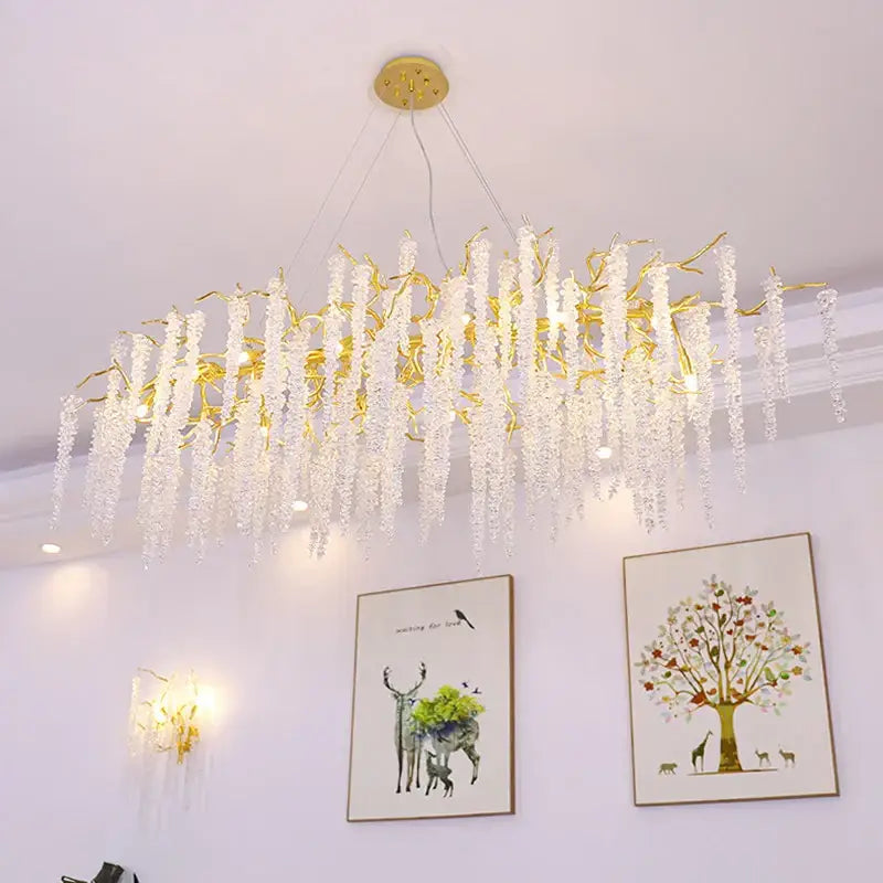 Postmodern gold decorbites crystal chandelier with cascading clear crystal strands resembling tree branches for dining room