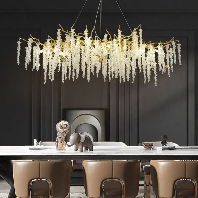 Postmodern gold decorbites crystal chandelier with cascading white crystal strands and butterfly accents for dining room