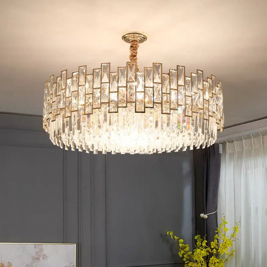 Postmodern gold decorbites crystal chandelier with clear faceted prisms in concentric rings for living room decor