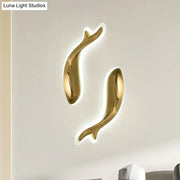 Postmodern gold dolphin led wall lighting fixture featuring sleek curves and integrated led lighting for bedroom use
