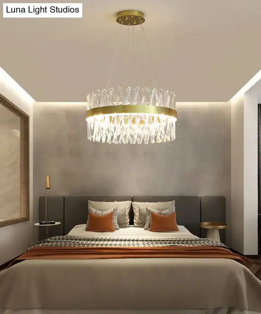 Postmodern gold finish pendant light with circular fixture width and dangling k9 crystal prisms for bedroom