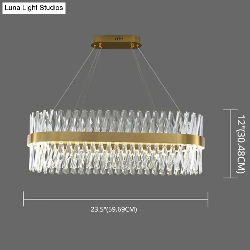 Postmodern gold finish pendant light with oval gold-toned fixture and cascading clear k9 crystal prisms for bedroom