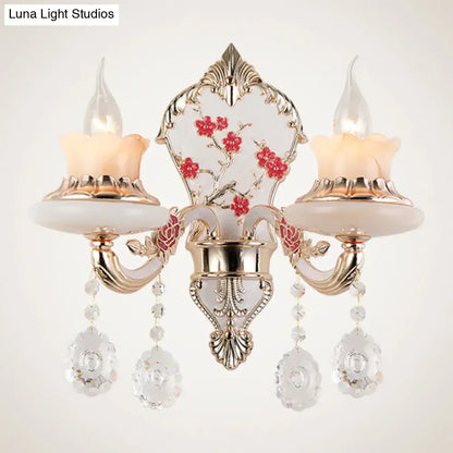 Ornate postmodern gold-toned wall sconce with frosted glass shades floral motifs and crystal pendants 110v-120v