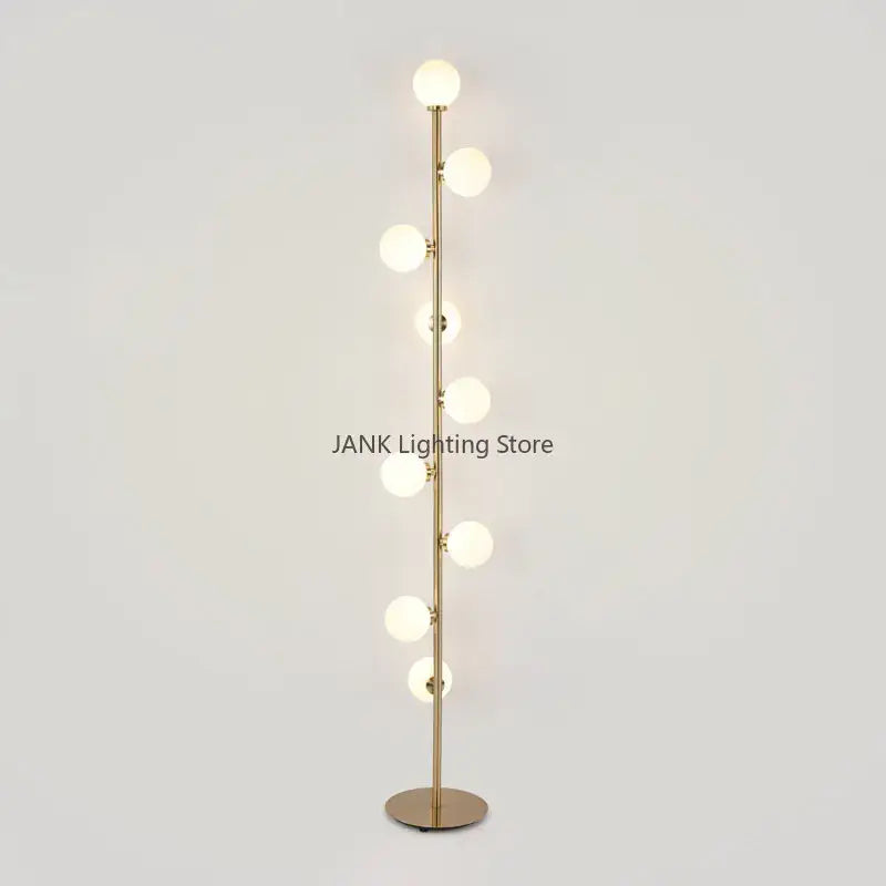 Postmodern gold glass ball standing lamp with slender pole and frosted glass bulbs for living room decorbites glass ball