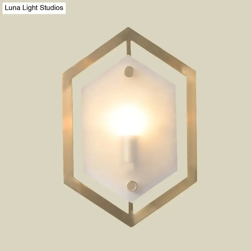 Postmodern gold hexagon wall lamp with a brass frame and frosted glass shade sconce lighting for bedroom use