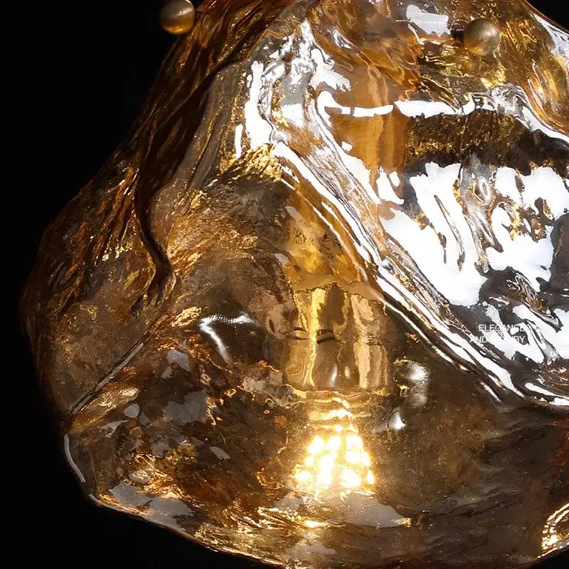 Postmodern gold irregular glass led chandelier featuring a glossy amber-gold glass led pendant for dining room lighting