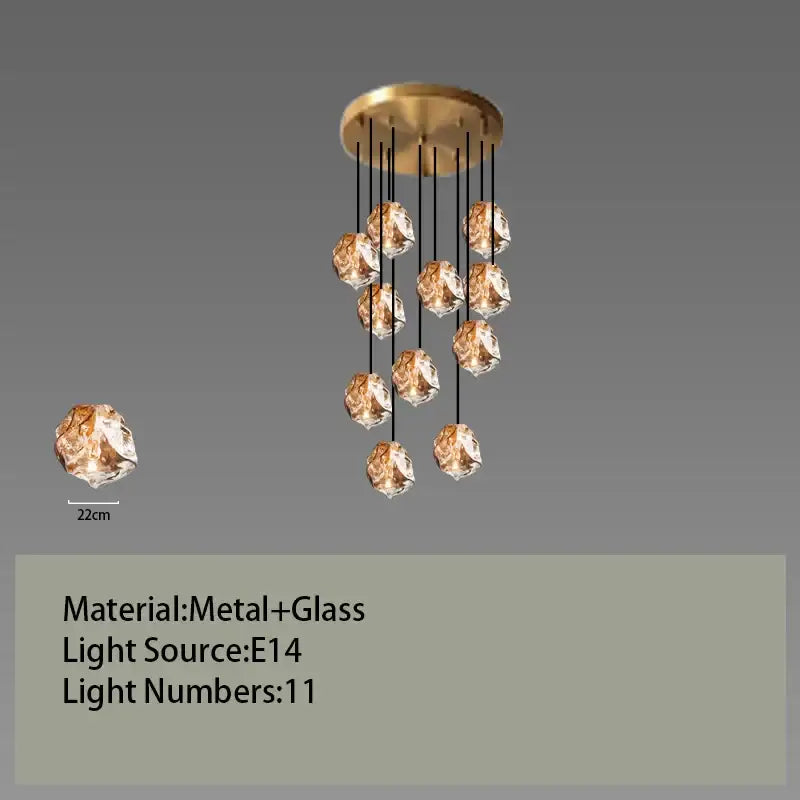 Postmodern gold glass led chandelier with 11 faceted globe lights suspended from a circular metal base for dining room