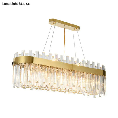 Postmodern gold oval island lighting fixture with clear crystal prisms and sleek metallic frame for 110v-120v use