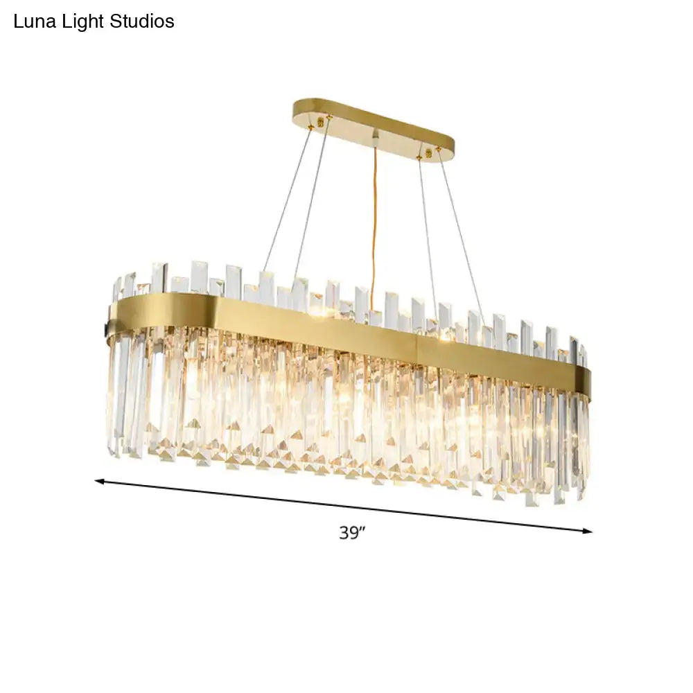 Elegant gold-toned oval island lighting fixture with cascading crystal prisms for 110v-120v dining room use