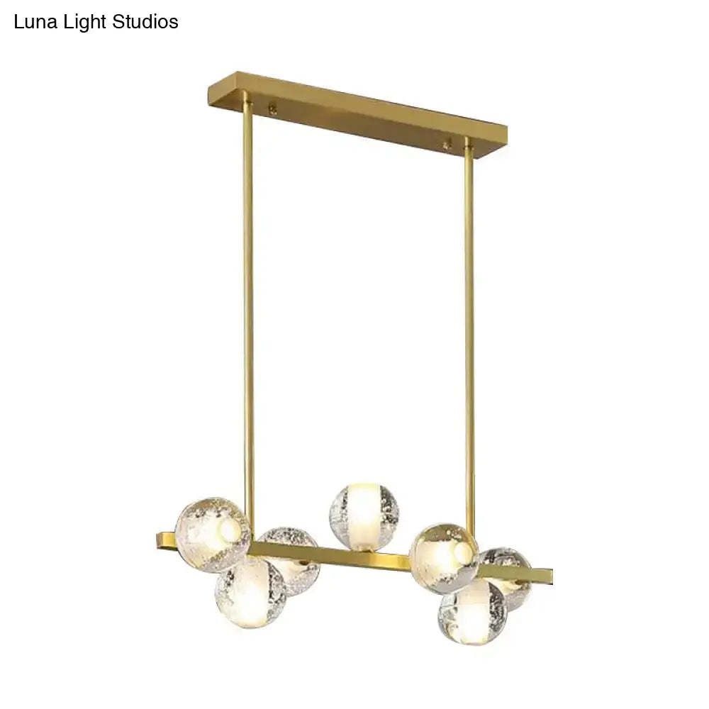 Gold-toned DecorBites postmodern seeded crystal suspension globe light with 6 heads and frosted crackle glass spheres
