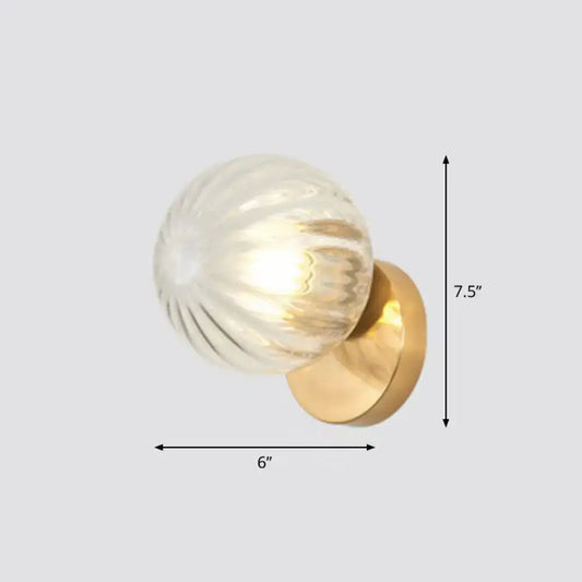 Postmodern gold textured glass ball wall sconce with clear globe and metal base for stairway wall lighting