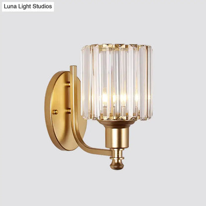 Postmodern gold wall lamp with prismatic crystal shade featuring vertical faceted glass rods for bedroom sconce