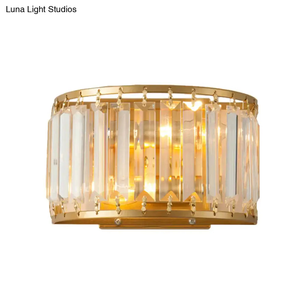 Postmodern gold wall lamp with prismatic crystal shade featuring vertical rods and dangling crystals for bedroom sconce