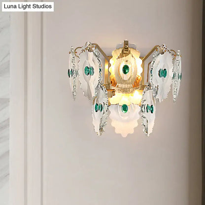 Elegant postmodern green gold gem crystal wall sconce with white scalloped glass and emerald accents, 10 inch fixture width